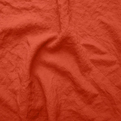 Swatch pour chemin de table en lin bordé "point de cheval" corail