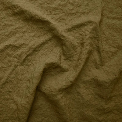 Swatch pour chemin de table en lin bordé "point de cheval" vert olive